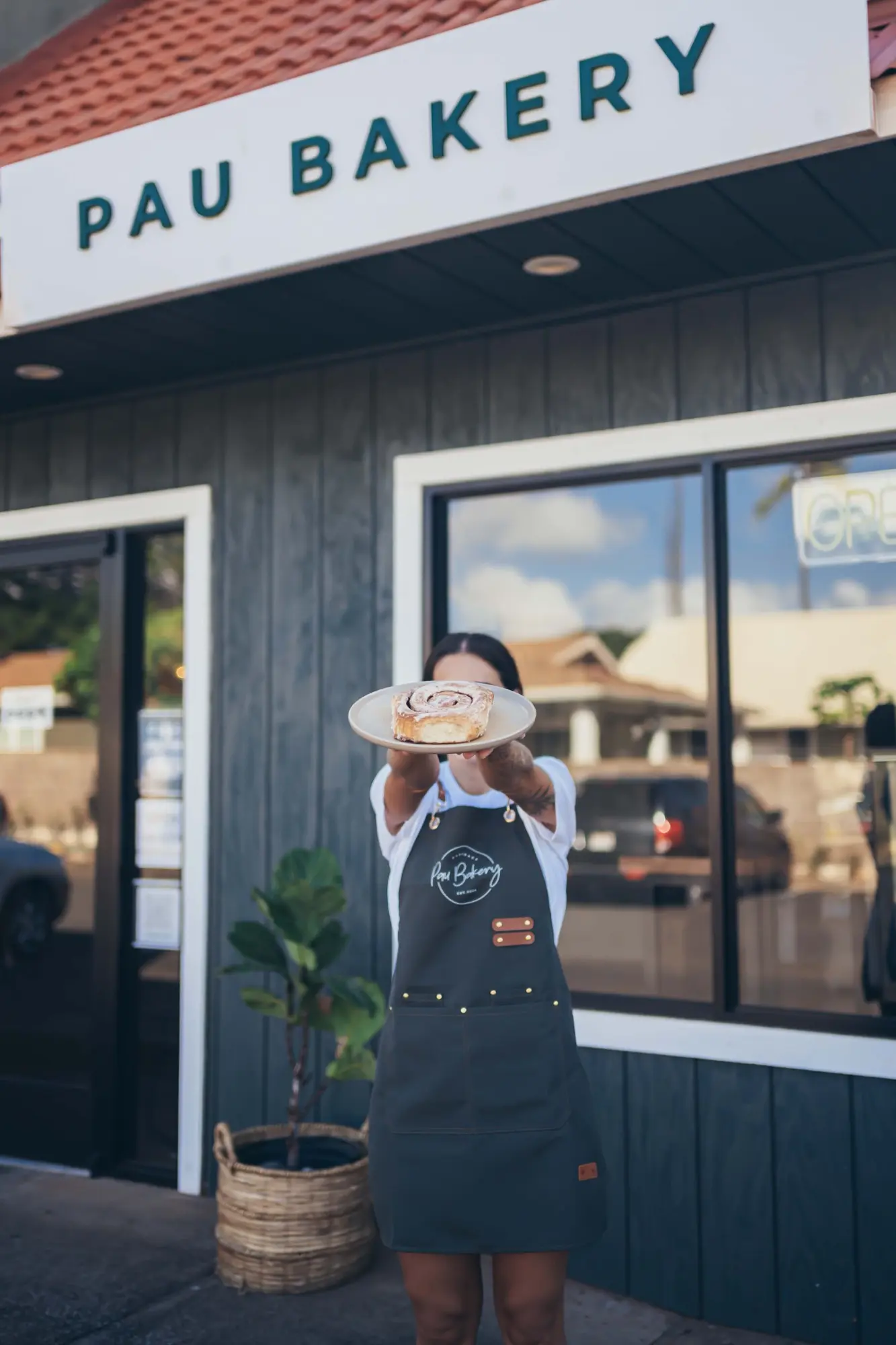 Freshly iced cinnamon roll from Pau Bakery